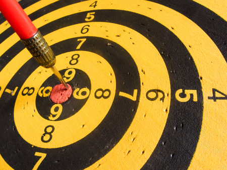 diagonal view of an used dartboard