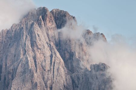 The northern side of Sasso Lungo at sunset from the Val Gardena areaの写真素材
