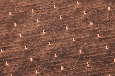texture on roof surface with accessories against the accumulation of snow on it