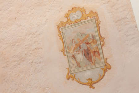 SIUSI, ITALY - JULY 27, 2017: Fresco painted outside the wall of the Maria Ausiliatrice little church representing a moment on the Way of the cross (Station I). The history of this church dates back to the XVII centuryのeditorial素材