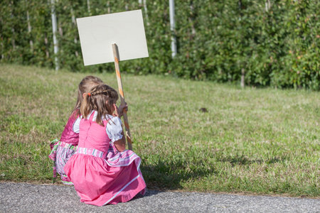 NAZ-SCIAVES, ITALY - OCTOBER 13, 2019: Young children in typical costume during an autumn local celebration in Val Isarco (South Tirol)のeditorial素材