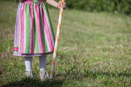 Young children in typical costume during an autumn local celebration in Val Isarco (South Tirol)の写真素材
