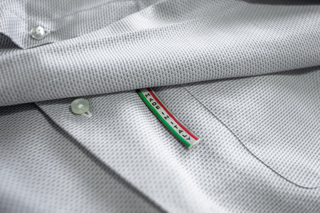 Made in Italy label on white cotton shirt