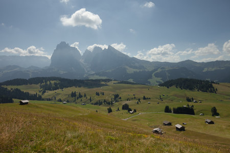 The wide meadows on the northern side of Sciliar mount from the Alpe di Siusi area in the Dolomitesの写真素材