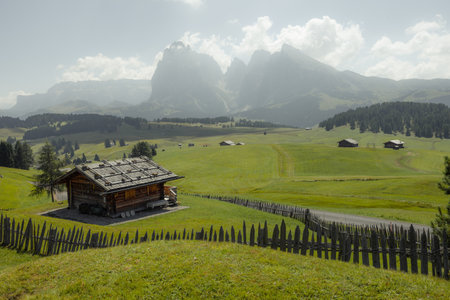 The wide meadows on the northern side of Sciliar mount from the Alpe di Siusi area in the Dolomitesの写真素材