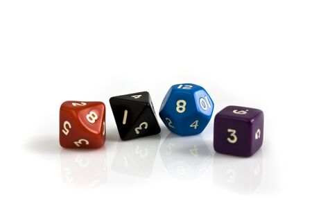 Colored dice on white table