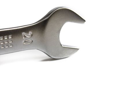 Open end wrench isolated on white background. Still-life picture taken in studio with soft-box.の写真素材