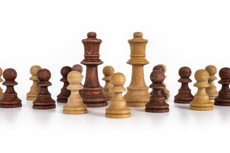 Chess pieces scattered on a table. Still-life picture taken in the studio with white background and softbox.の写真素材