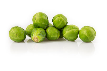Brussels sprout isolated on white background. Still-life picture of green cabbages taken in studio with soft-box.の写真素材