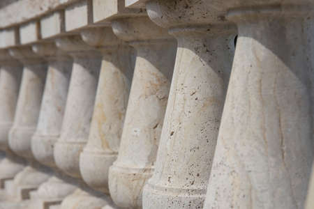 White Italian balustrade. Datail of a classical architectural element in concrete / stone.
