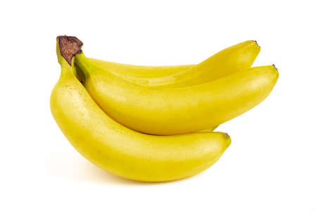 Bunch of bananas isolated on white background. Still life picture taken in studio with soft-box.の写真素材