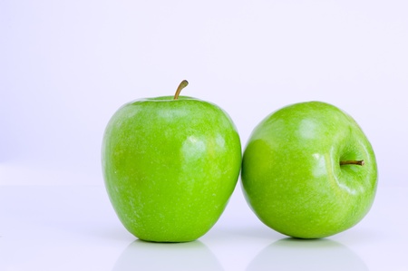 Two green applesの写真素材