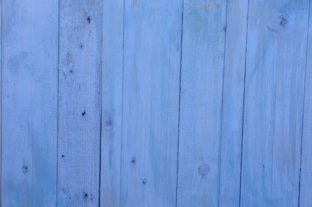 vintage wood background texture with knots and nail holesの写真素材