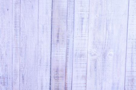 vintage wood background texture with knots and nail holesの写真素材