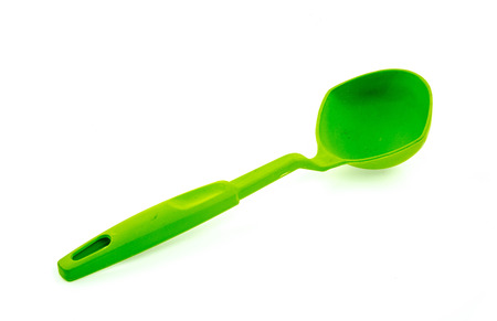 Plastic kitchen utensils  on a white backgroundの写真素材