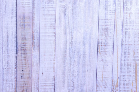 vintage wood background texture with knots and nail holesの写真素材