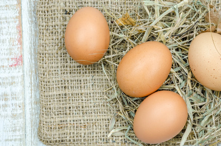 eggs on wood vintage backgroundの写真素材
