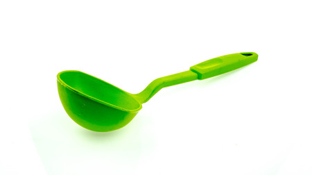 Plastic kitchen utensils  on a white backgroundの写真素材
