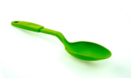 Plastic kitchen utensils  on a white backgroundの写真素材