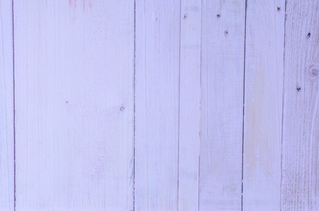 vintage wood background texture with knots and nail holesの写真素材