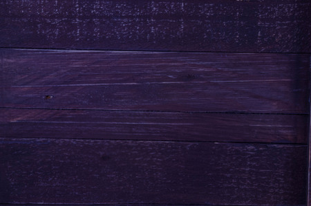 vintage wood background texture with knots and nail holesの写真素材