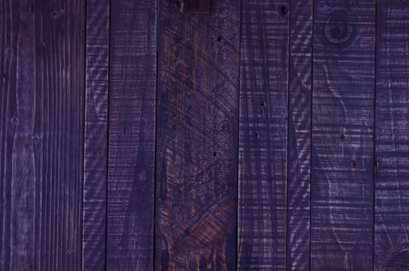 vintage wood background texture with knots and nail holesの写真素材