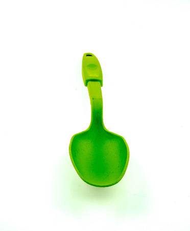 Plastic kitchen utensils  on a white backgroundの写真素材