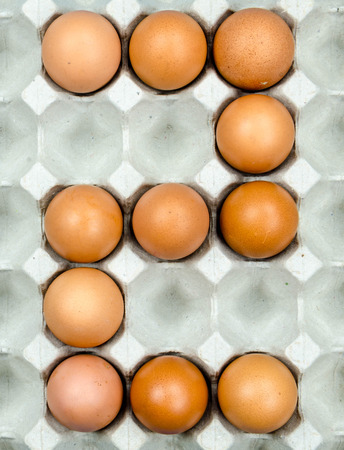 Set of number two show by eggs in paper tray