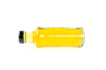 Apple juice a bottle on a white background.の写真素材