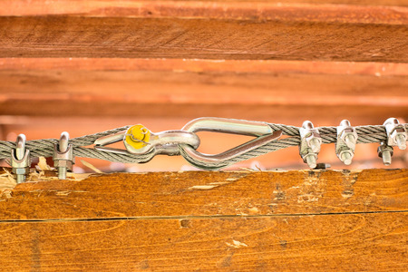 Rope fixation in woodの写真素材