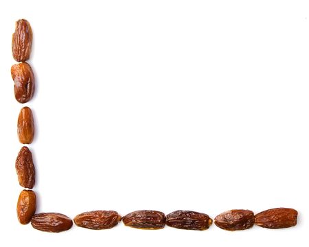 dates isolated on white, dried fruitsの写真素材