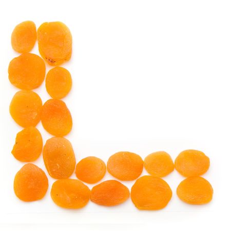 dried apricots isoalted on whiteの写真素材