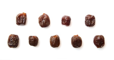 dates isolated on white, dried fruitsの写真素材