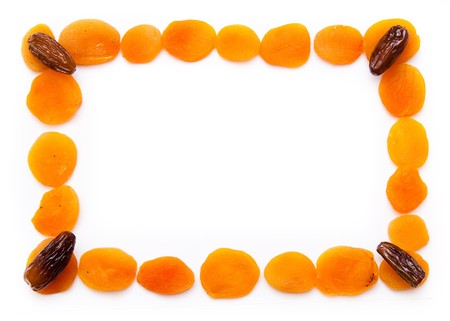 photo frame, dried apricots and datesの写真素材