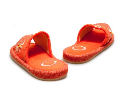 orange slippers isolated on whiteの写真素材