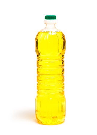 oil in bottle isolated on whiteの写真素材
