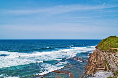 blue ocean and high cliffの写真素材