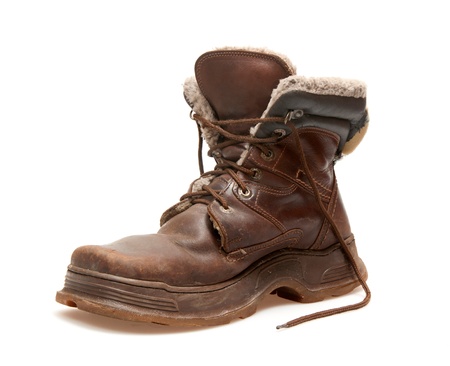 old brown boot isolated on white