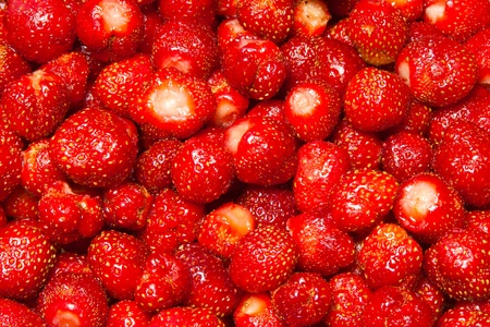 red peeled strawberries,  tasty backgroundの写真素材