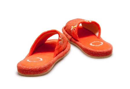 orange slippers isolated on whiteの写真素材
