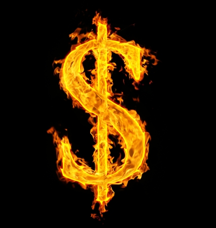 fire sign dollar on blackの写真素材
