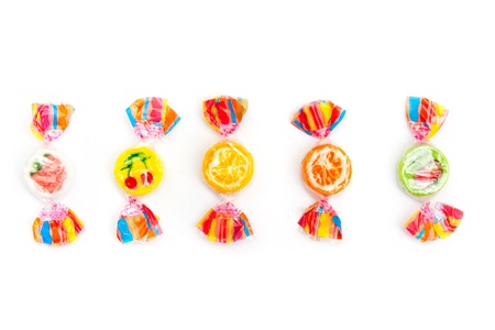 five different candies on white
