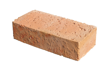 Single red brick with granite grains isolated on white backgroundの写真素材