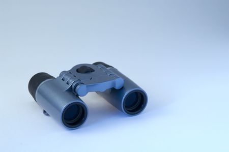 blue binocular isolated on white backgroundの写真素材