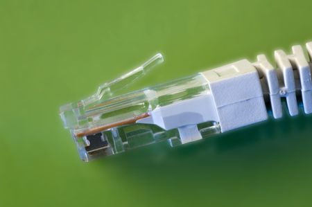 close-up of cat 5 utp network cable, green background