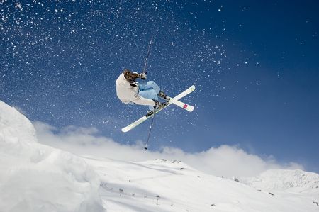skier jumping high in the airの写真素材