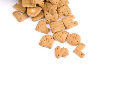 letter cookies falling from above, isolated on white backgroundの写真素材