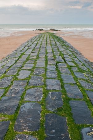 tides on belgian beachの写真素材