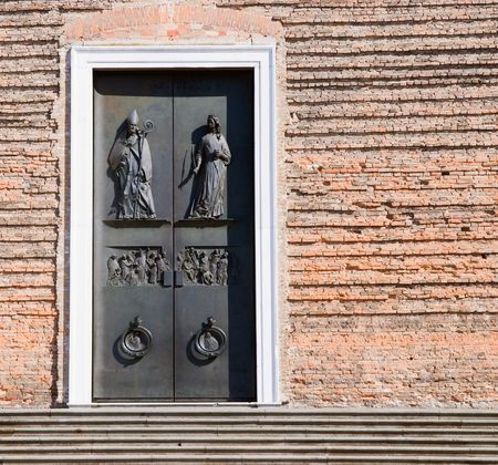 entrance door and wall of St. Justine Basilica in Padova Italyの写真素材