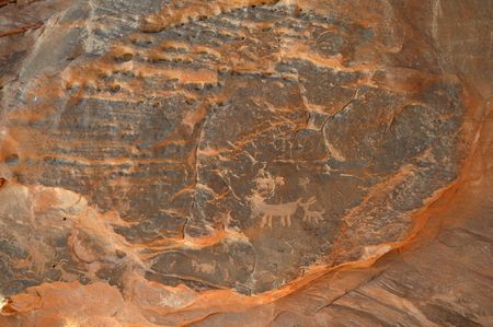 old inscription and symbols on a rock in the desertの写真素材